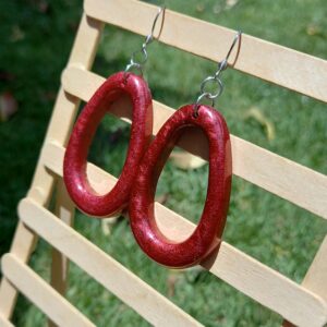 Stainless steel red russet oval earrings.